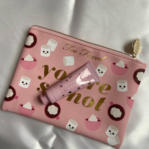 Too faced makeup pouch & Estée Lauder hand - Picture 2 of 9